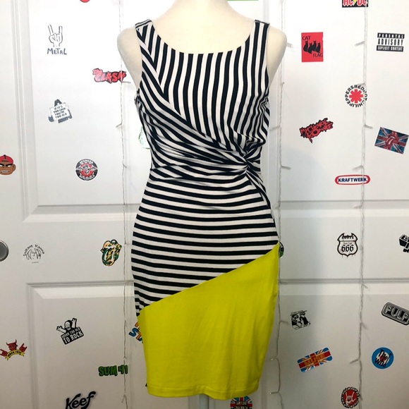 bebe Dresses & Skirts - Bebe black & white striped w/yellow bottom fitted mini dress. NWOT! Sz XS